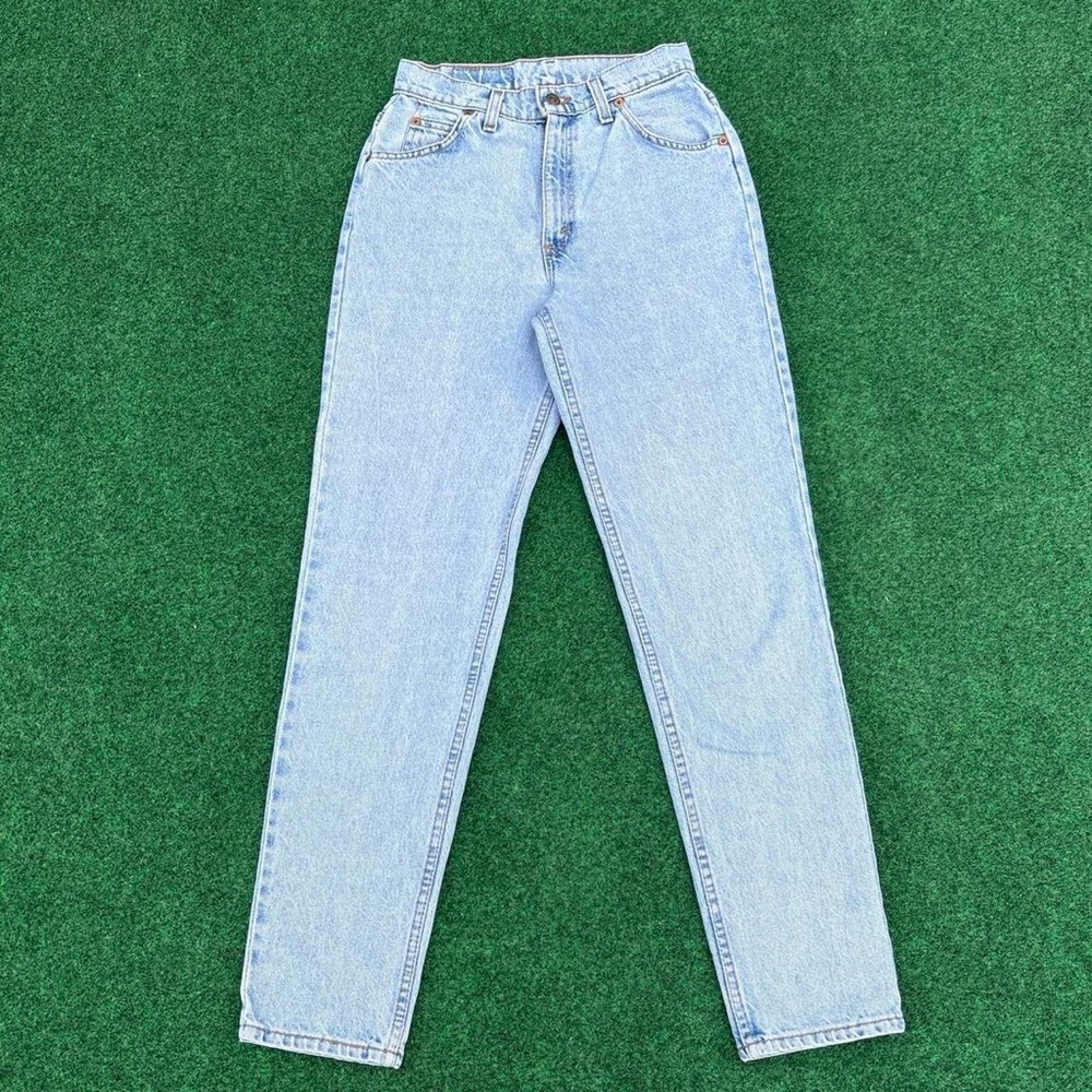 Vintage high waisted light wash slim fit tapered leg Levi’s jeans